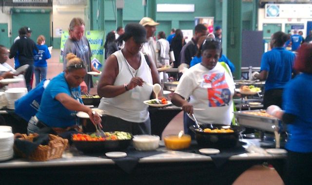 Each year, CACH hosts Project Homeless Connect, an event that targets the hardest-to-reach men, women, teens, and children who are homeless or living on the street. Pictured above are guests having lunch at last year's event.